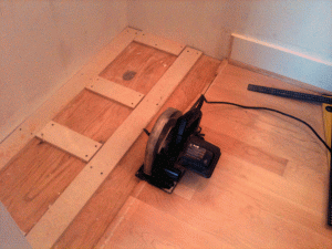 I used a circular saw set to a little over 3/4" to create a straight edge where the flooring ends.