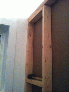 I added a 2x4 up high and about 36" down from the top so I could fasten the 12" cabinets securely.