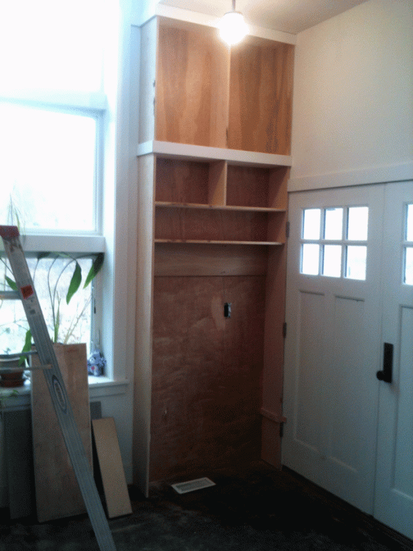 The tall bookcases are all trimmed out and ready for painting.