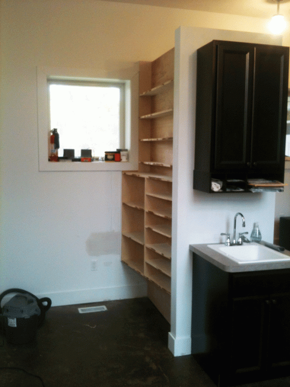 The angled bookcase installed and ready for painting.