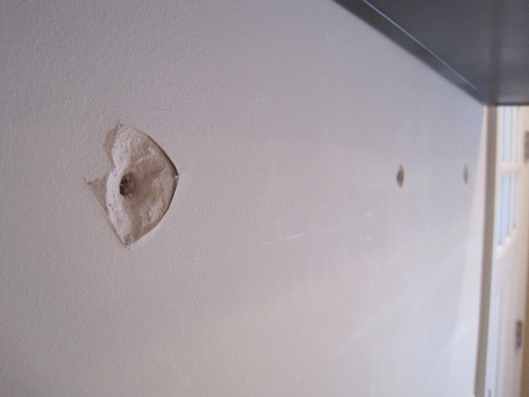 I cut away the damaged drywall.