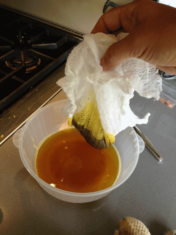 The cheese cloth filters impurities: bee parts, honey, mold, etc. Pour liquid wax through cloth into a bowl then put the wax back in the boiler to melt again; repeat until pure wax is left.