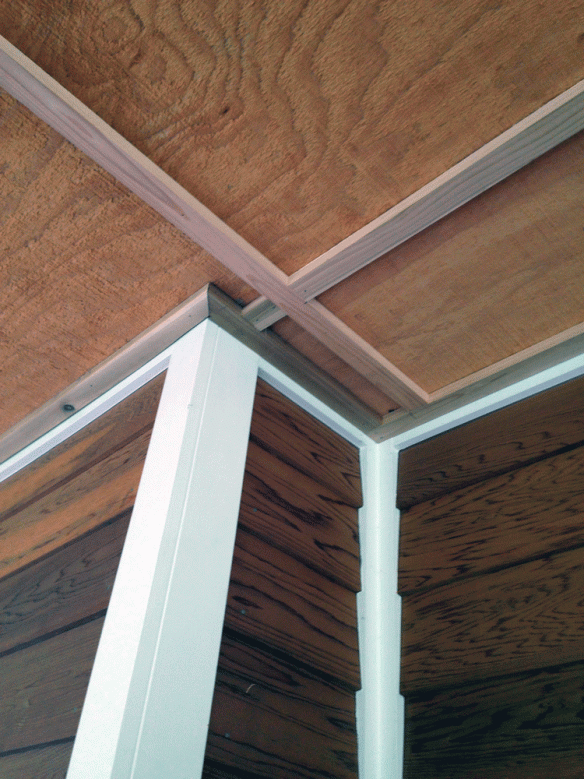 Detail of ceiling trim near chimney corner