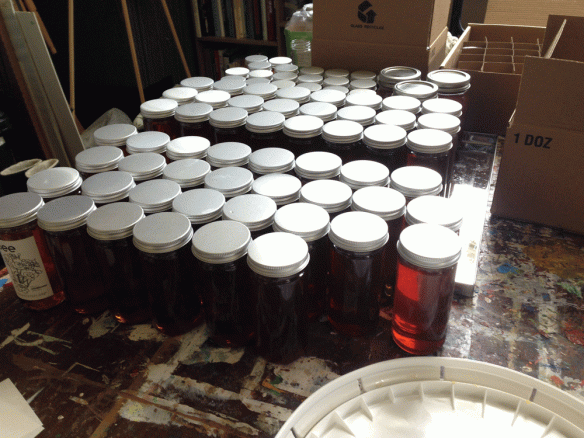 The summer 2015 haul of honey from hive No. 1. 15 frames. 54 8oz bottles, 22 4oz bottles, 3 mason jars. 50 lbs. of honey total.